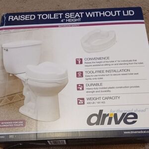 Drive 4inch raised toilet seat. New in box